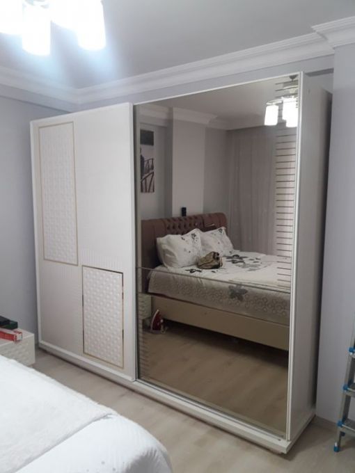 Denizköşkler mahallesi sürgülü ray kapaklı elbise dolabı tamir işlemi